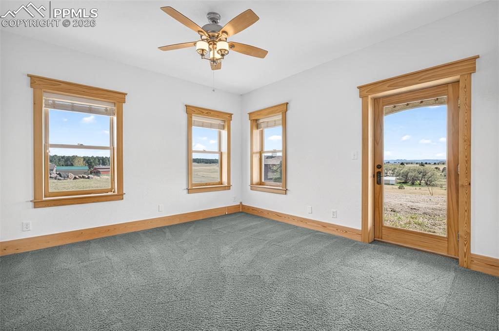 Image 33 of 50: Bedroom 3 in basement Walkout access