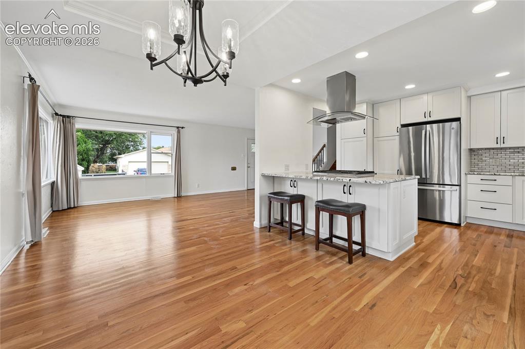Image 14 of 50: Dining Room (Looking Towards Kitchen & Living Room)