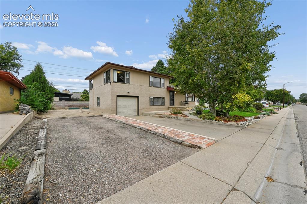 Image 3 of 50: Space for Plenty of Parking!!