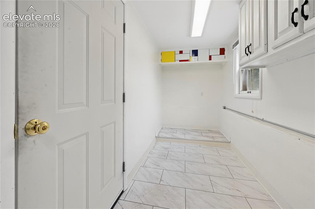 Image 36 of 50: HUGE, Expanded Laundry with Door to Garage