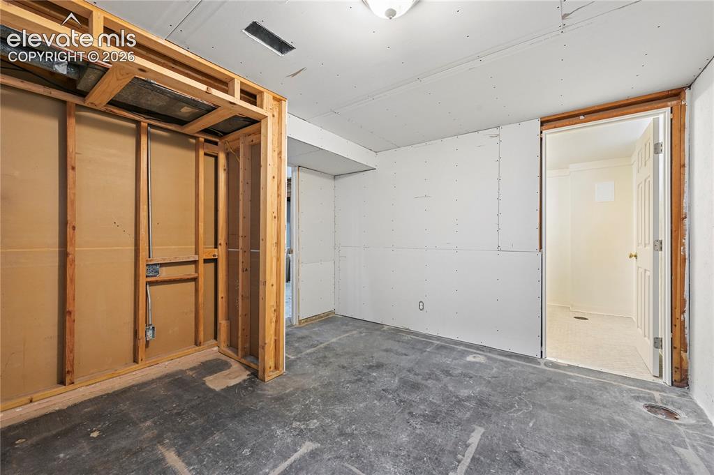 Image 41 of 50: Basement Bedroom