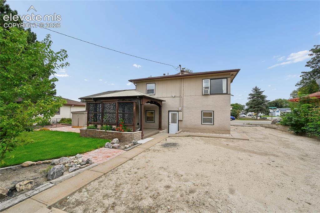 Image 49 of 50: Backyard with Space for Parking or Your Next Project!