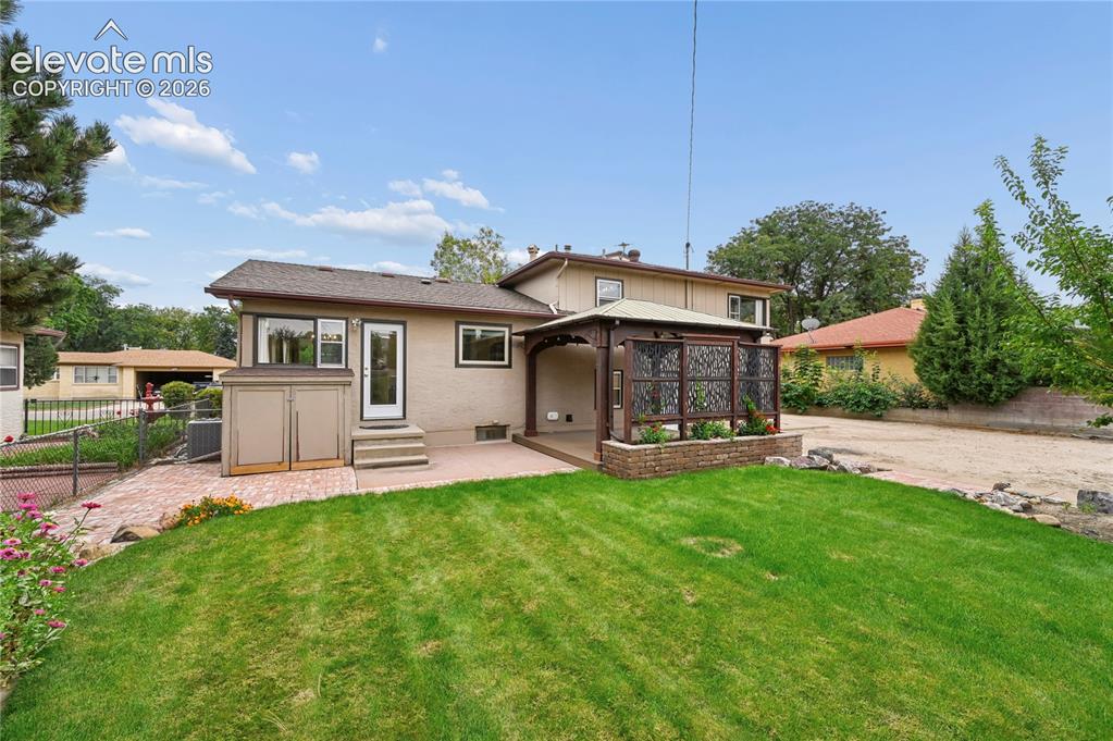 Image 50 of 50: Beautifully Landscaped Backyard