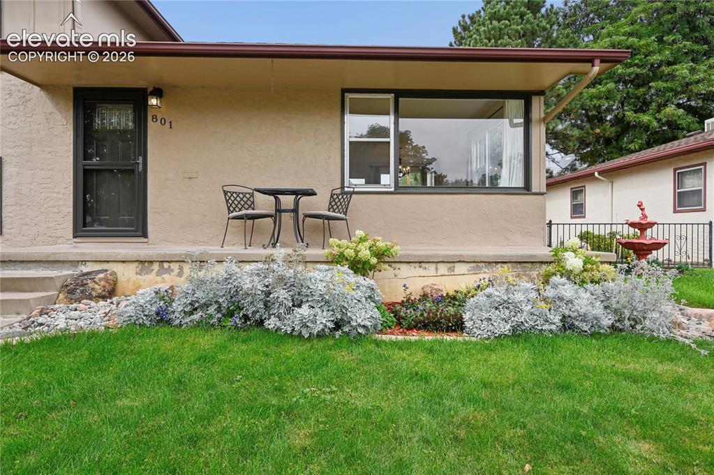 Image 6 of 50: Beautifully Landscaped Front Yard