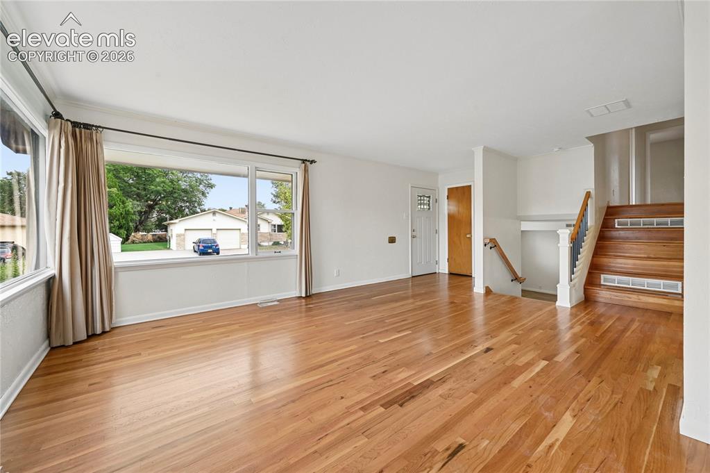 Image 9 of 50: Living Room (Looking Towards Entry & Stairs)