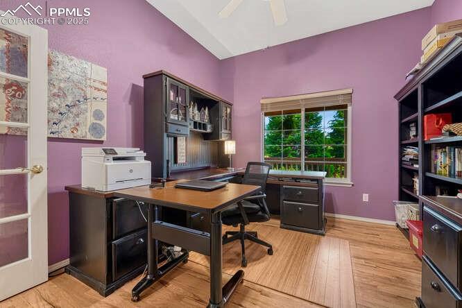 Image 22 of 48: Main level bedroom currently used as an office