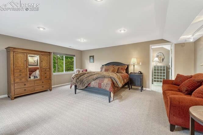 Image 35 of 48: Bedroom featuring light colored carpet and recessed lighting
