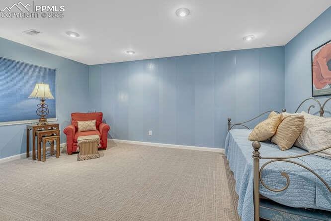 Image 37 of 48: Carpeted bedroom with baseboards