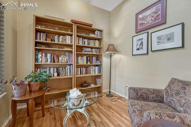 Image 5 of 48: Office/Library area featuring wood floors
