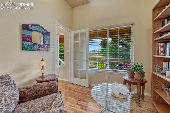 Image 6 of 48: Office/Library area featuring wood floors