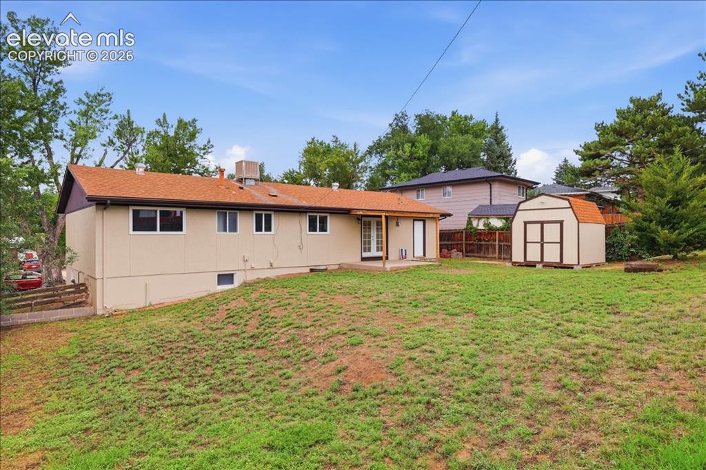 Image 43 of 44: Large shed included.