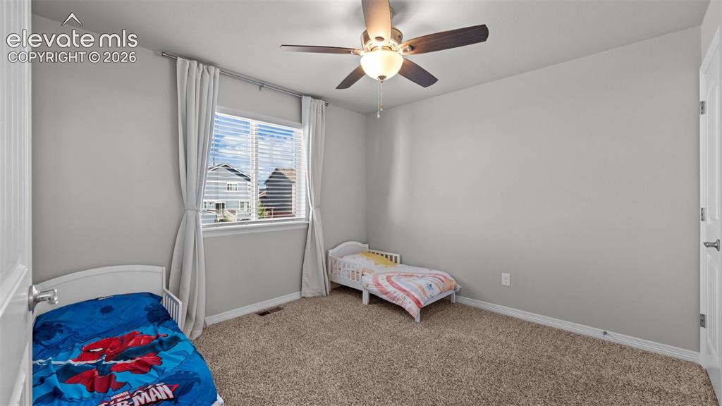 Image 16 of 39: Bedroom