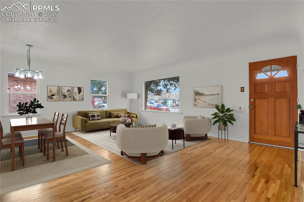 Image 3 of 29: Beautiful original hardwood flooring throughout. Virtually Staged