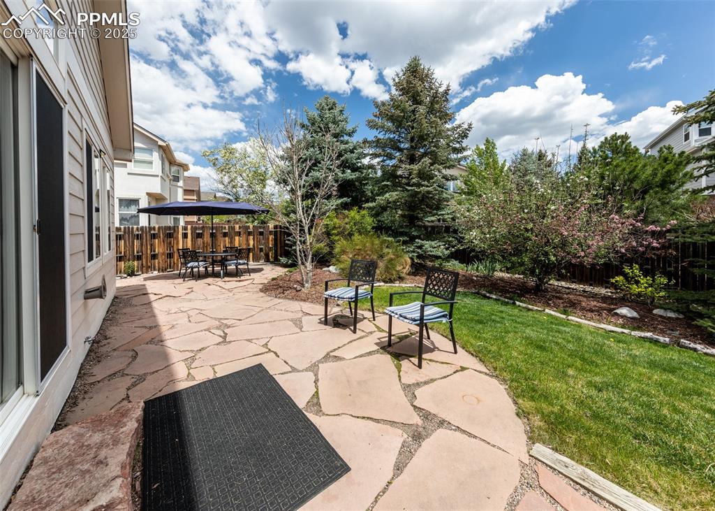 Image 49 of 50: View of patio / terrace with outdoor dining space