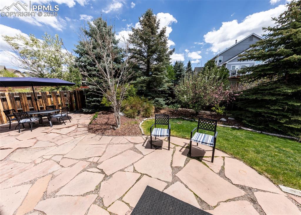 Image 50 of 50: View of patio / terrace with fence