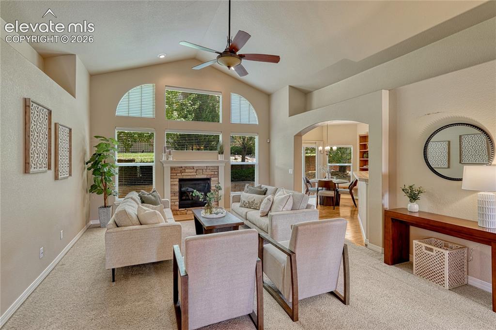 Image 11 of 42: ...multiple windows and gas fireplace.