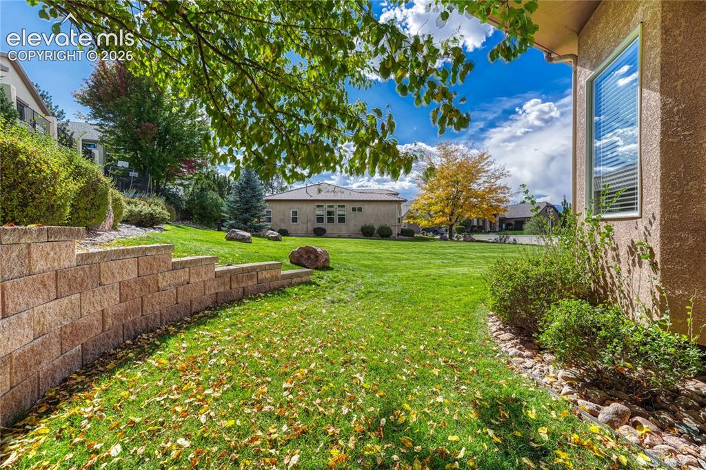 Image 16 of 42: Enjoy the added privacy from no home on the adjacent lot.