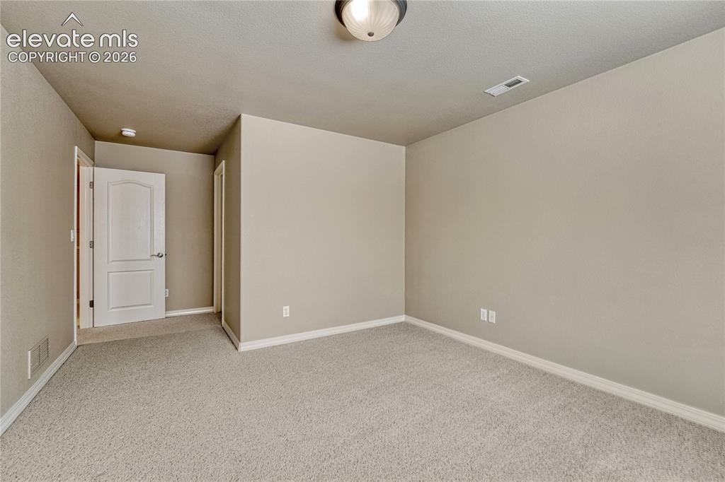 Image 30 of 42: ...basement bedrooms with...