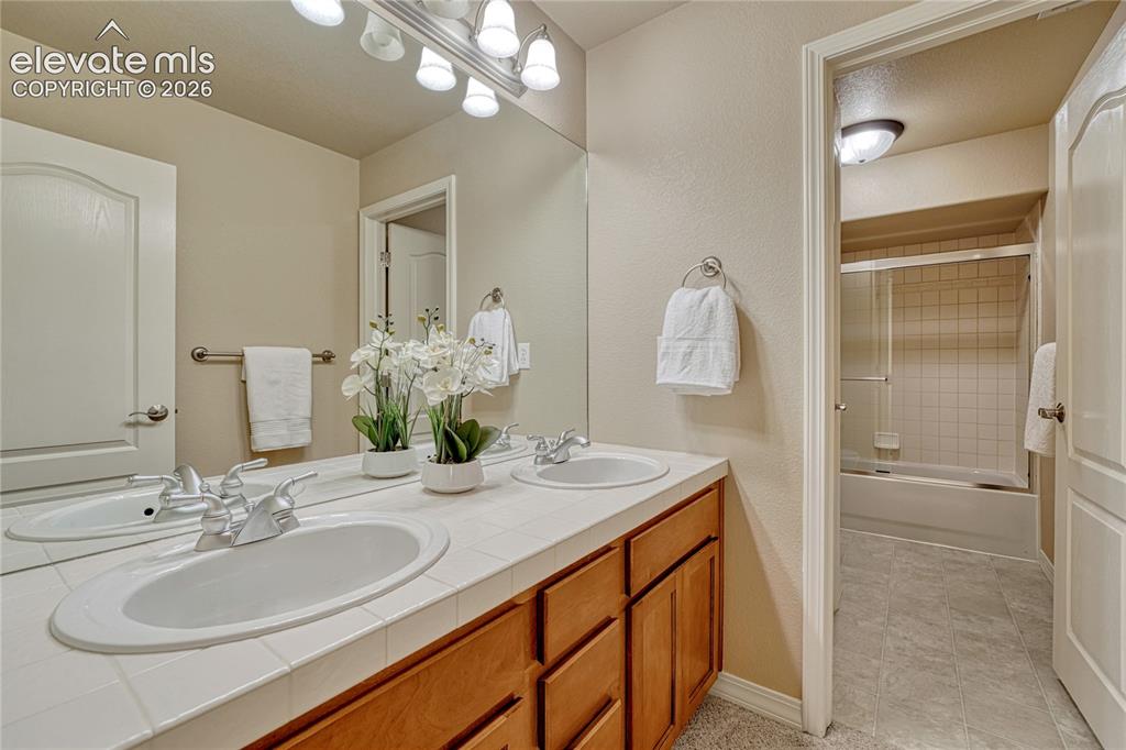 Image 32 of 42: Full basement bathroom. 