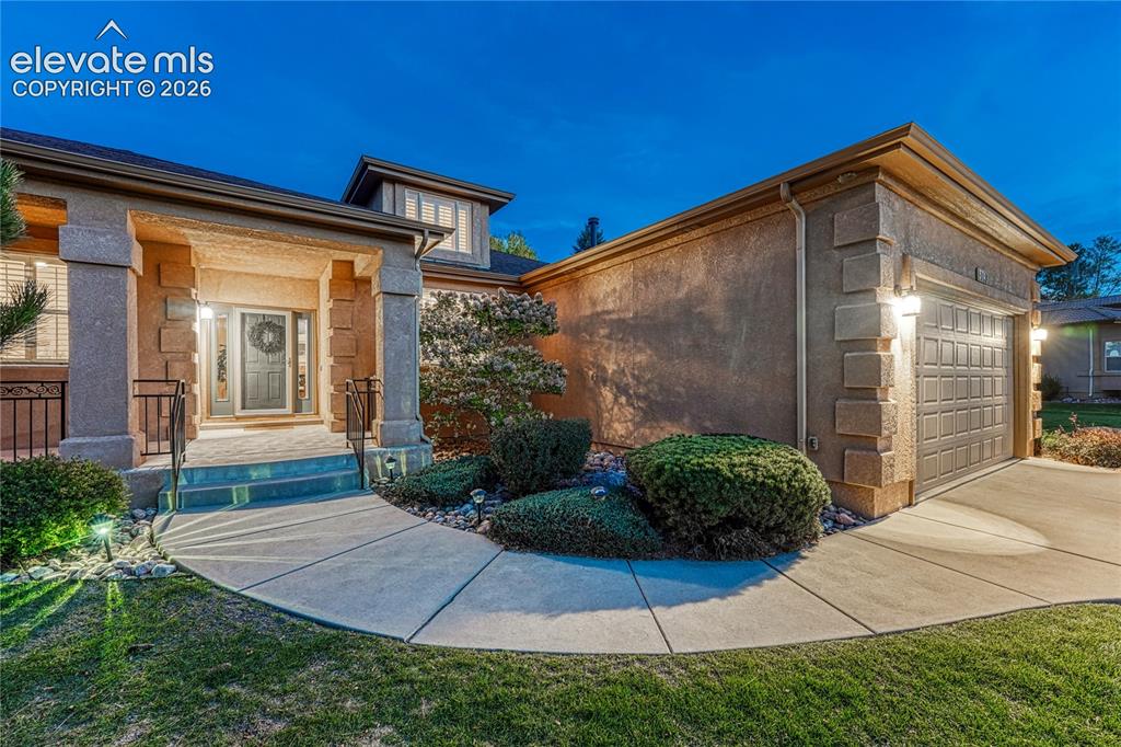 Image 4 of 42: Welcoming entry and large covered front porch. 