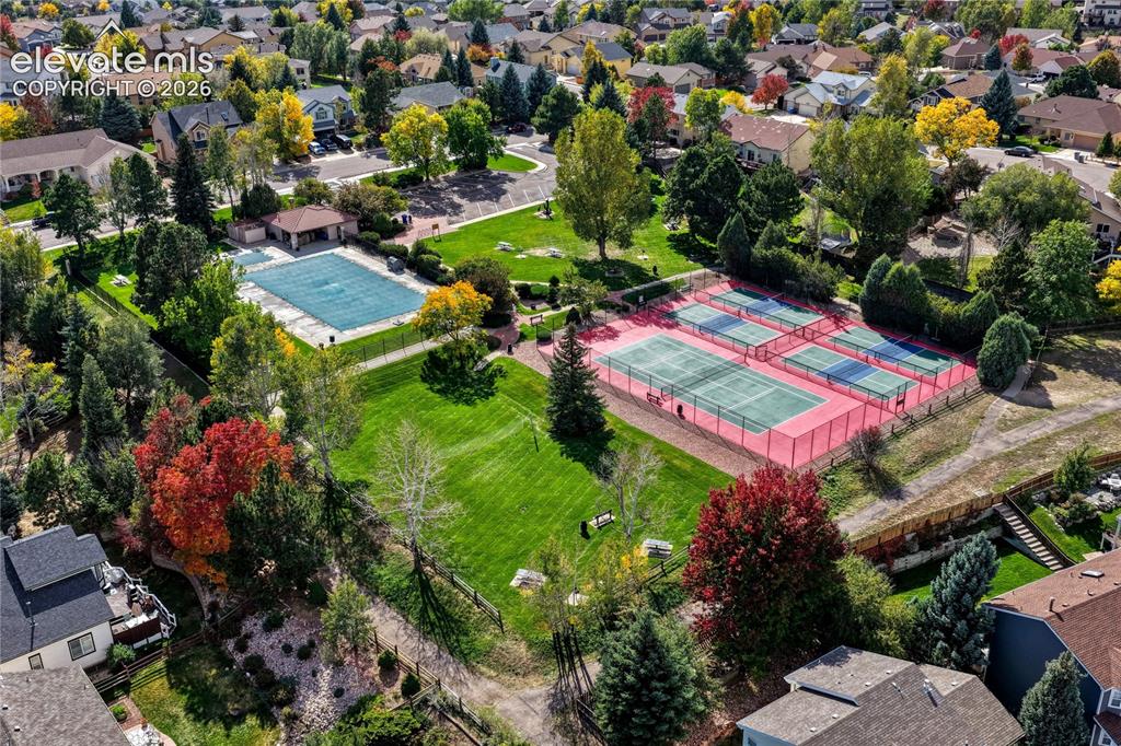 Image 40 of 42: Beautifully kept pool, tennis and pickle ball courts. 