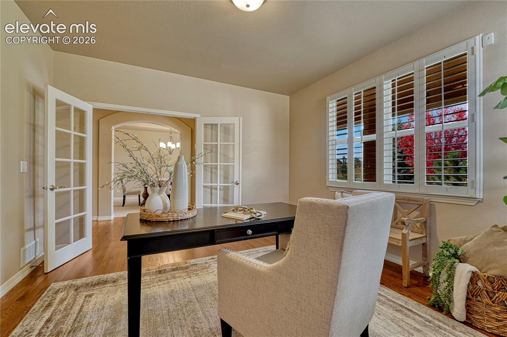 Image 9 of 42: ...French doors and plantation shutters.
