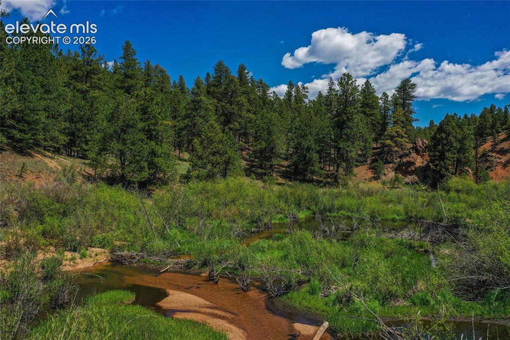 Image 2 of 49: Aerial of creek 500ft of creek frontage