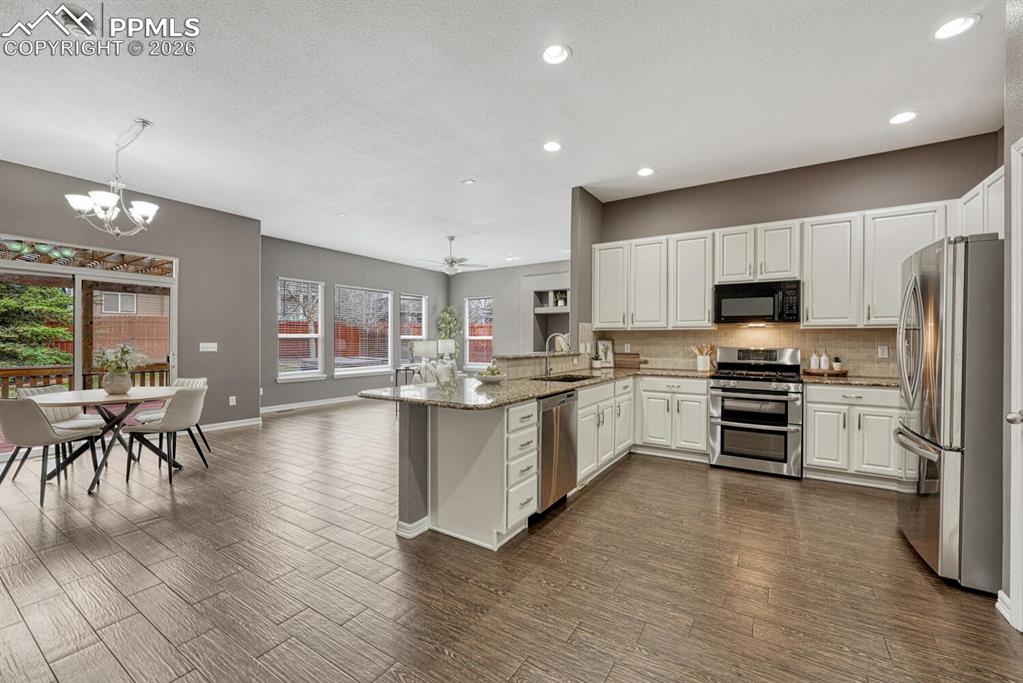 Image 11 of 50: Covered front porch.