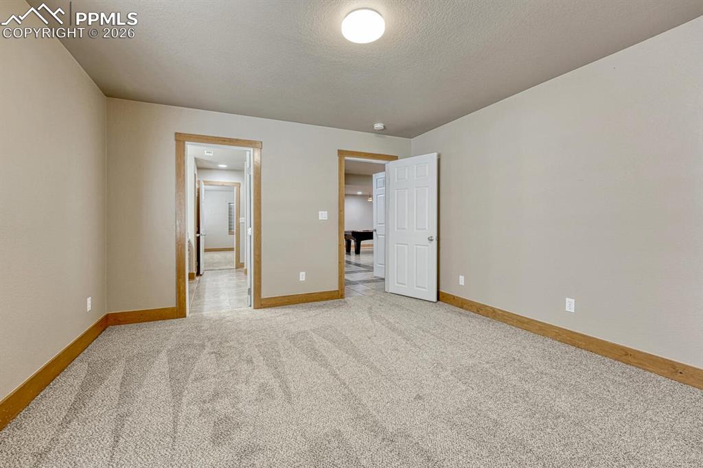 Image 38 of 50: Basement Flex Room designed for many uses such as a craft room, play room, 