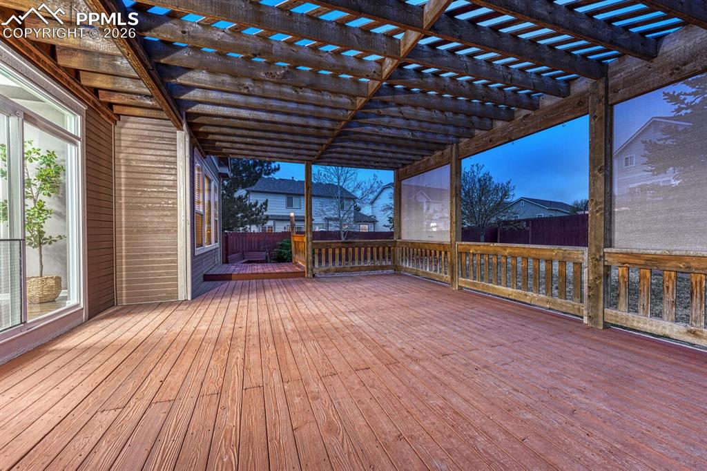 Image 44 of 50: Basement Bedroom #5 has neutral carpet and access to the Basement Bathroom.