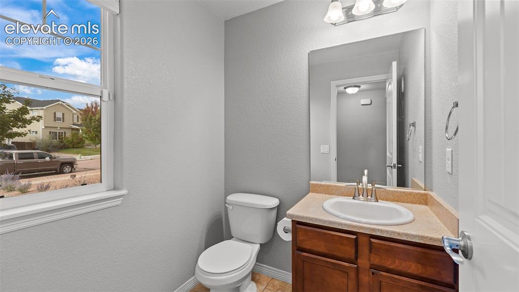 Image 15 of 41: Main level half bath
