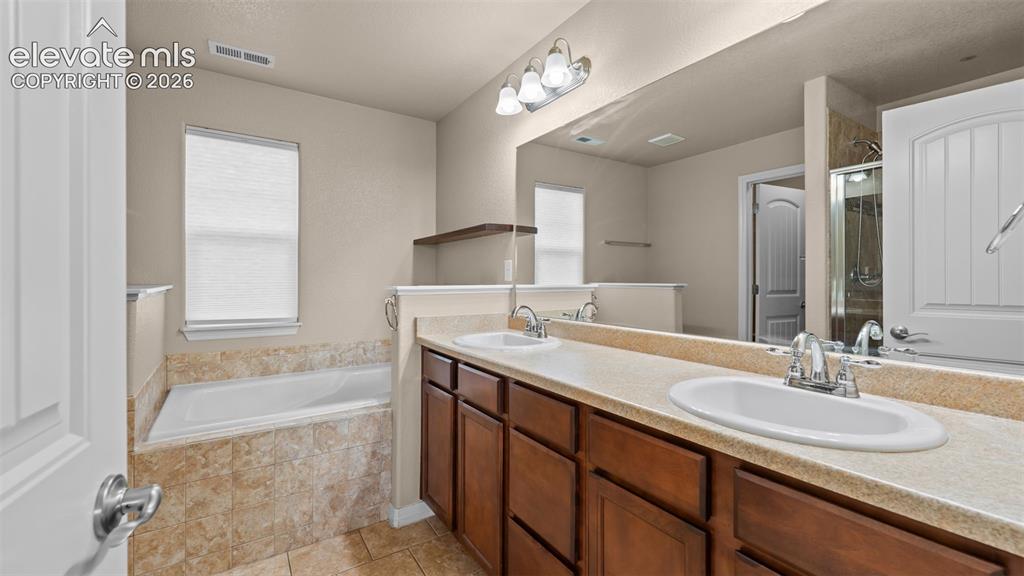 Image 18 of 41: Master Bathroom