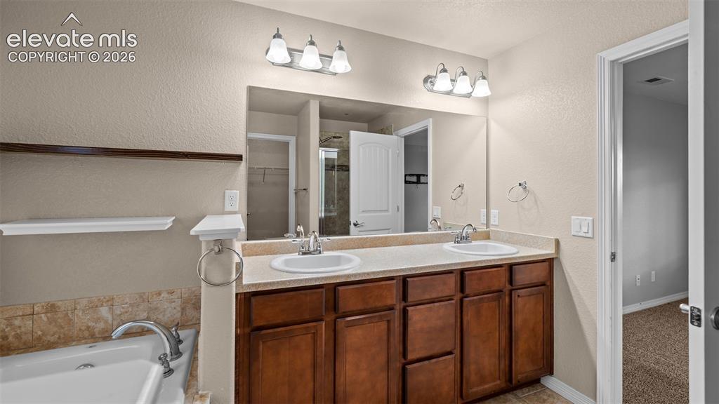 Image 19 of 41: Master Bathroom