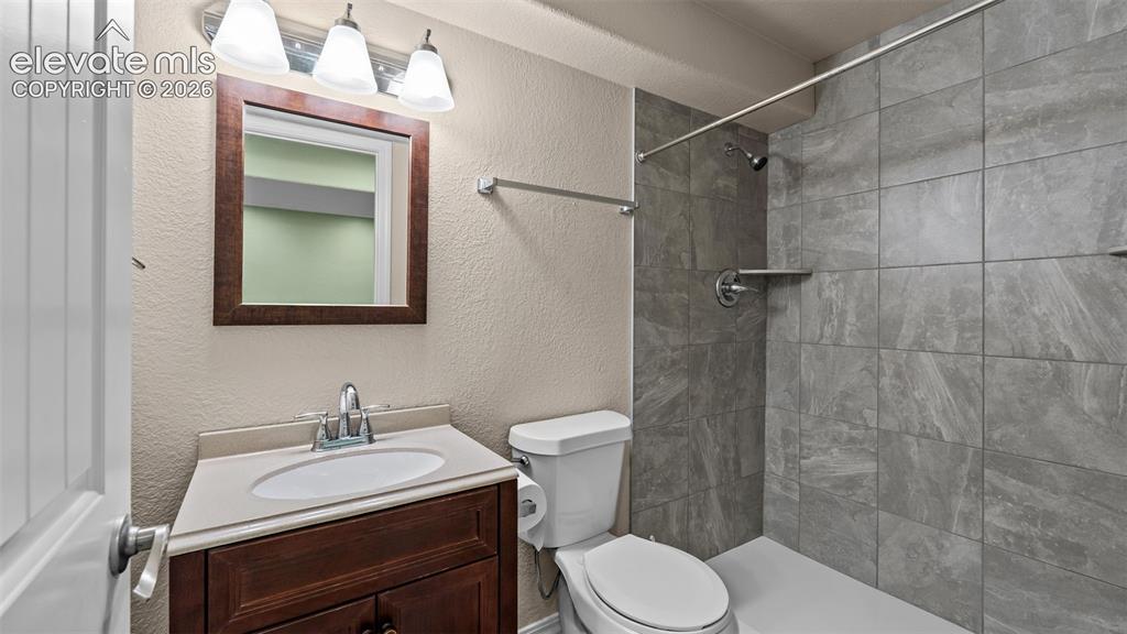 Image 26 of 41: Basement bathroom
