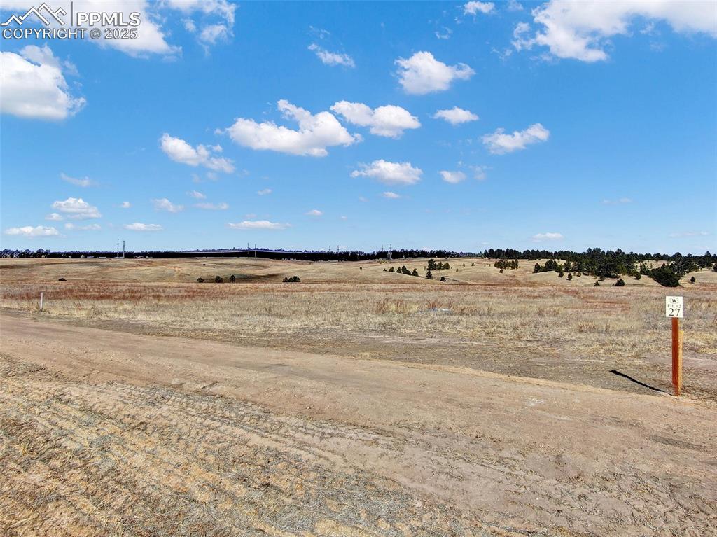 Image 2 of 10: Homesite behind sign