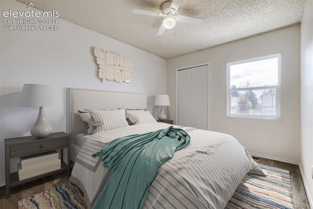 Image 19 of 30: virtually staged - 2nd Bedroom - 10x10