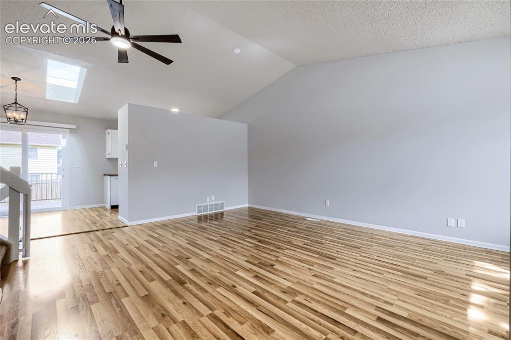 Image 5 of 30: Another view of living room. Interior was just repainted
