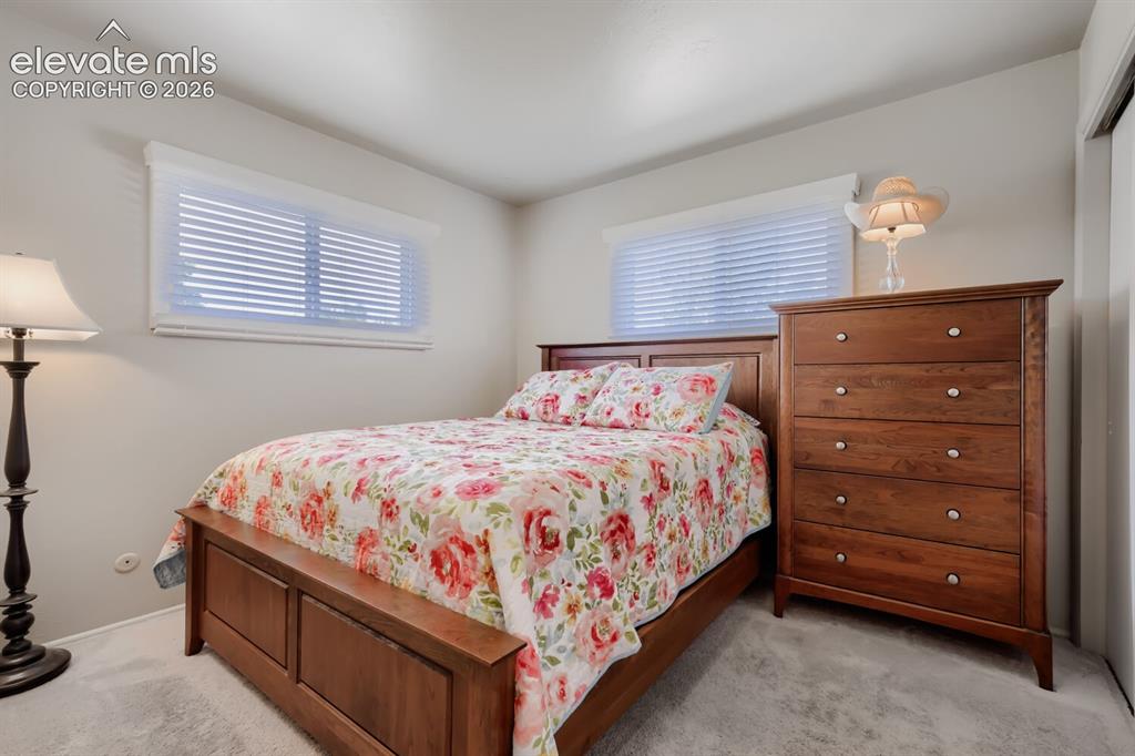 Image 14 of 29: 2nd bedroom on main level