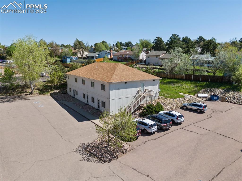 Caption: Aerial perspective of suburban area -5785 Building 