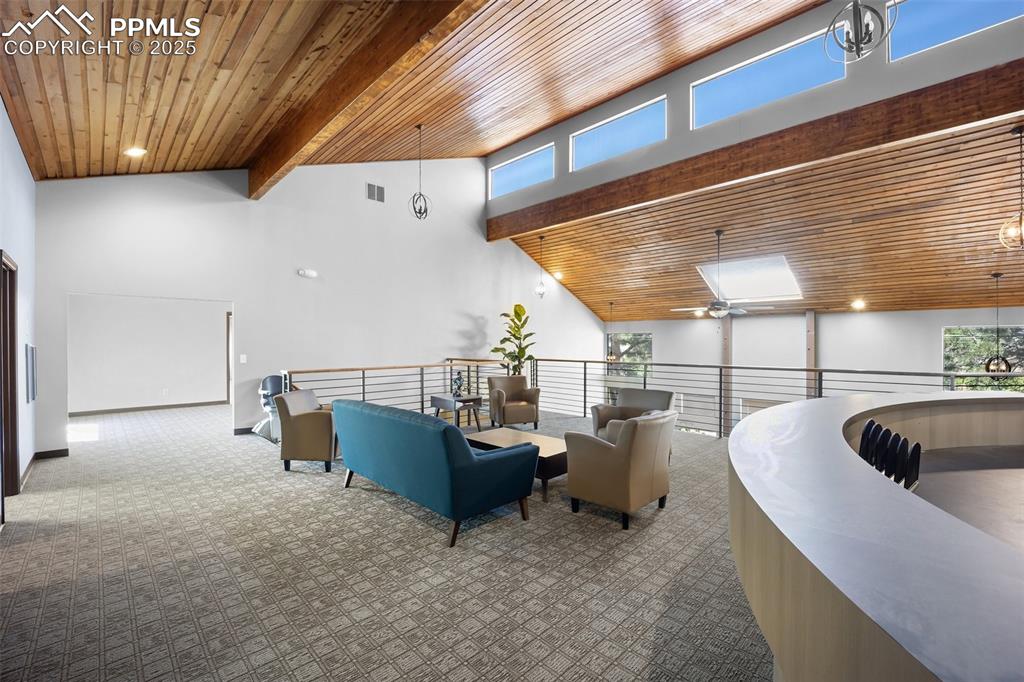Image 19 of 50: Lobby featuring wood ceiling, high vaulted ceiling, and beam ceiling-5775 B