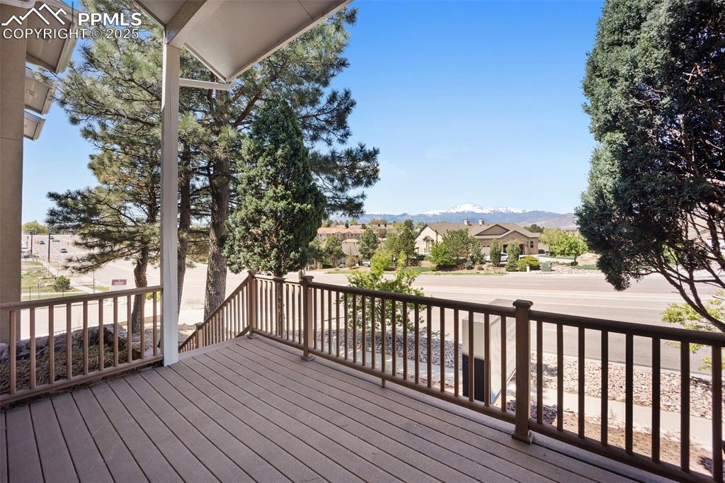 Image 33 of 50: Wooden deck with a residential view and a mountain view-5775 Building 