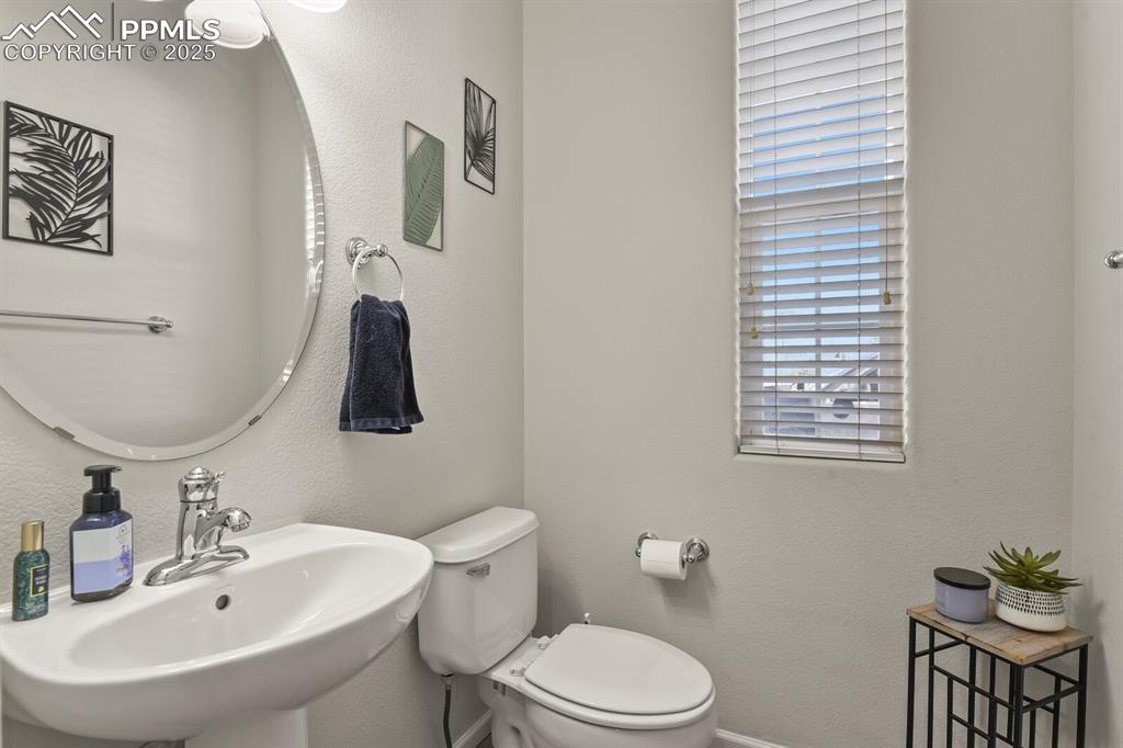 Image 8 of 27: Bathroom featuring a textured wall