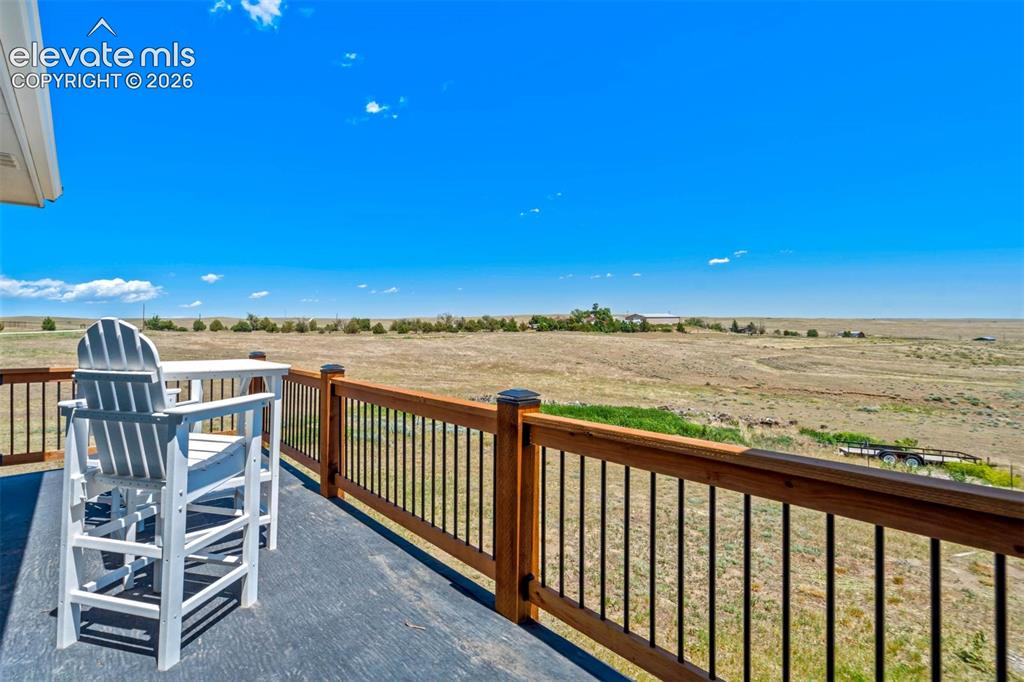 Image 12 of 50: Private deck off the primary bedroom.