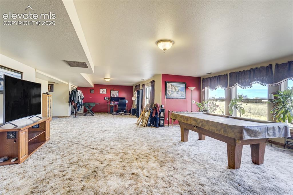 Image 21 of 50: Pool table included.