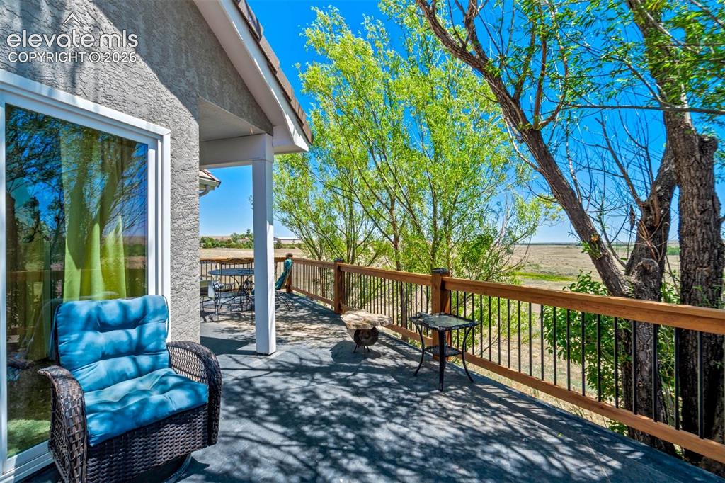 Image 8 of 50: Wonderful views of the property off the deck.