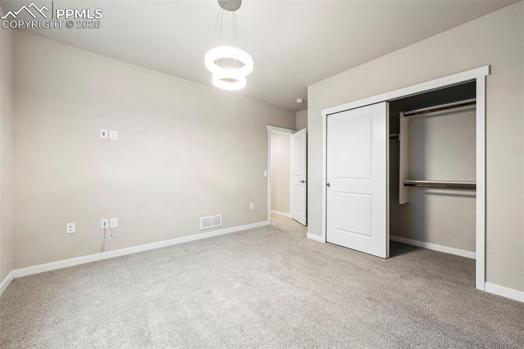 Image 44 of 50: Virtually staged 4th bedroom