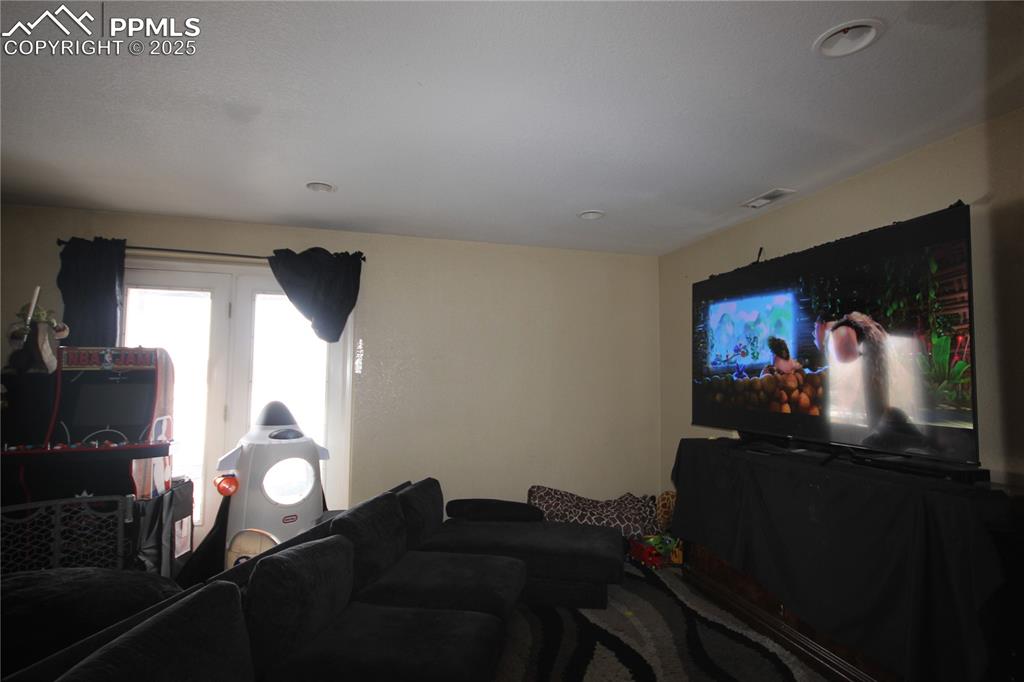 Image 24 of 32: Basement is a walk out to the backyard