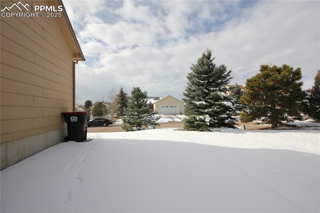 Image 32 of 32: This area is concrete slab for additional exterior space