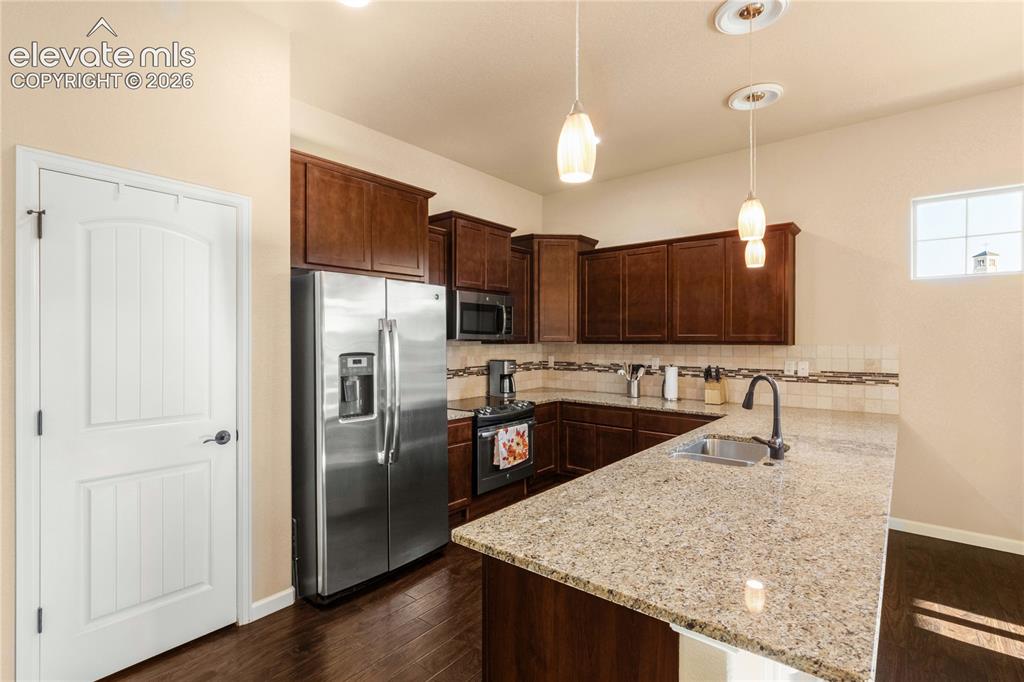 Image 12 of 33: Large dining area available for huge table for entertaining,
