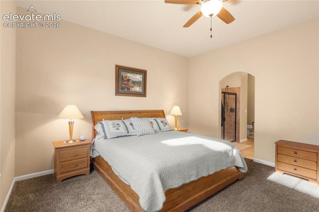 Image 20 of 33: Primary Bedroom with sitting area